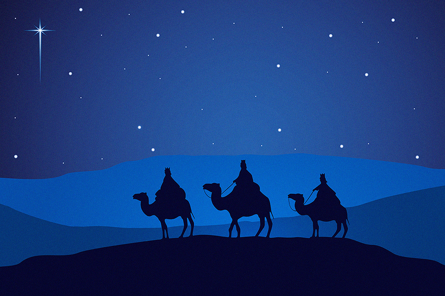 Silhouette of the Three Wise Men riding camels in the evening